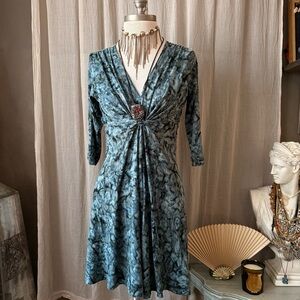 Blue ruched tie-dye midi dress with 3/4 sleeves and a deep V-neckline